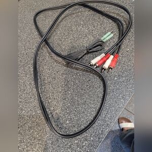 Audio Cable with Red and Black Connectors and Second One with Green Connectors